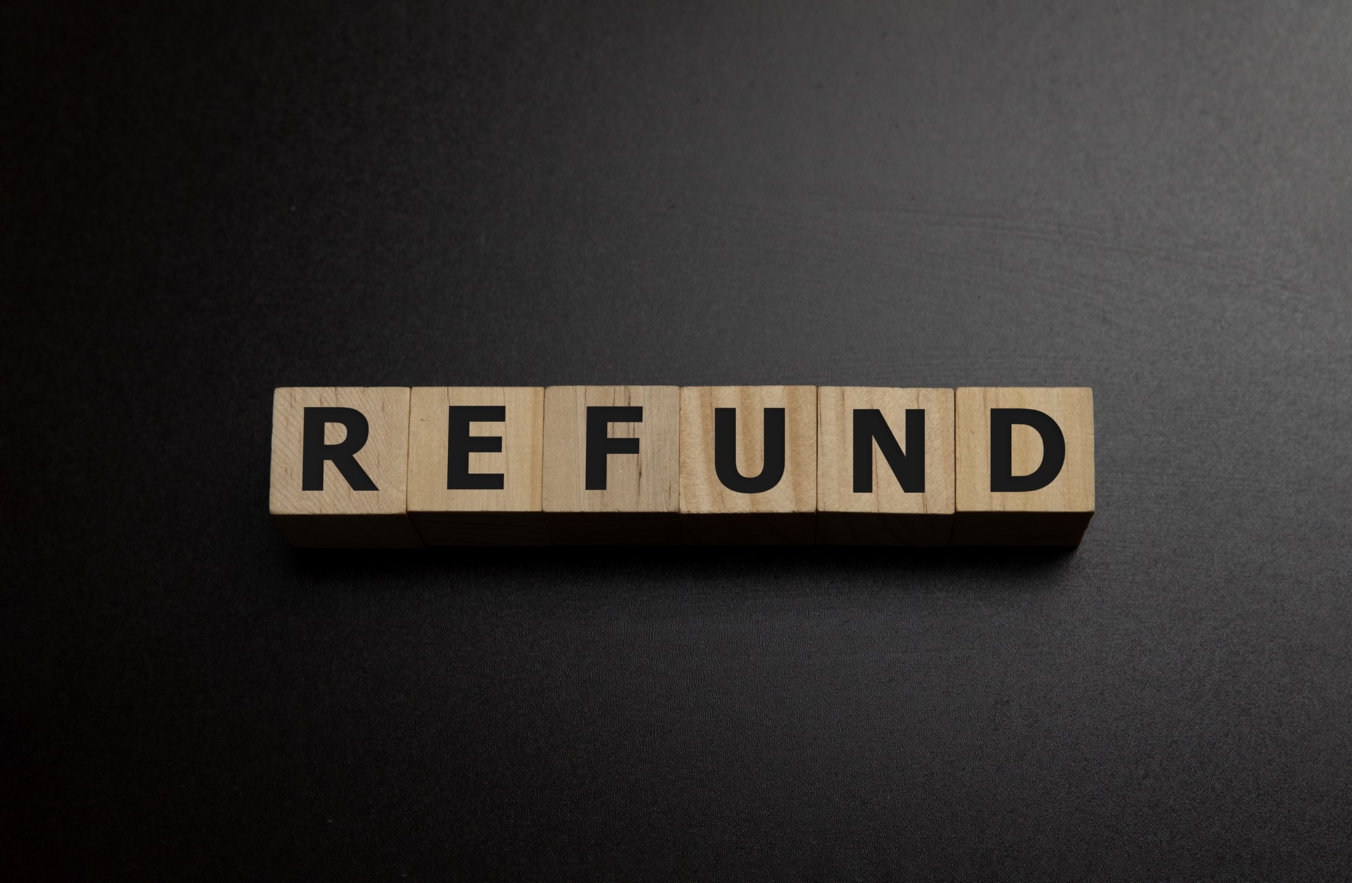 Letter,Block,In,Word,Refund,On,Wood,Background