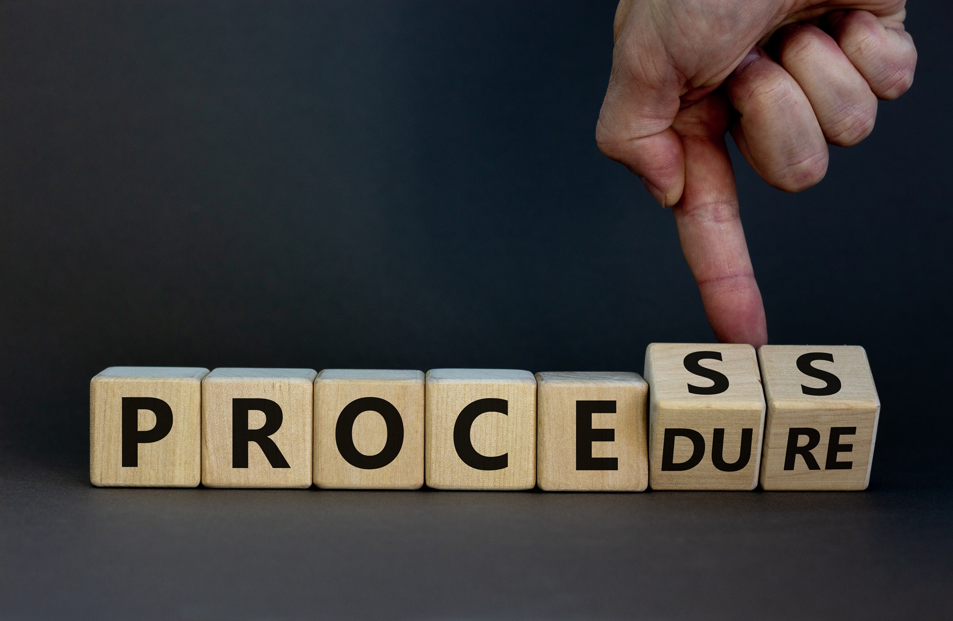 Process,Or,Procedure,Symbol.,Businessman,Turns,Wooden,Cubes,,Changes,A